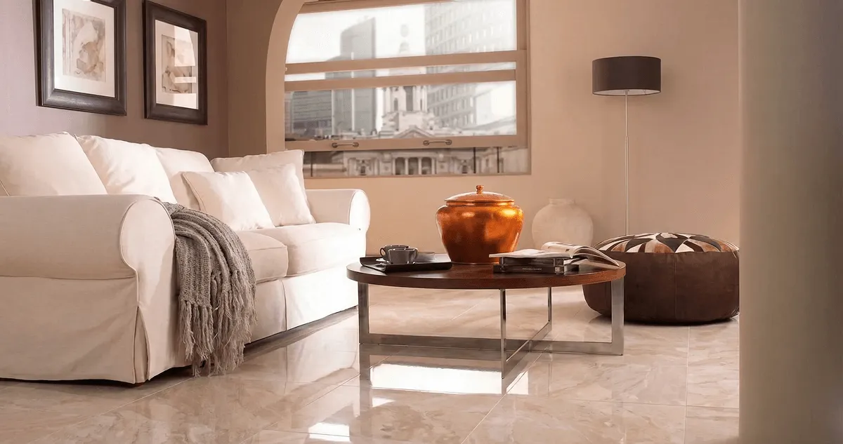 Modern living room with professionally installed marble flooring, a beige sofa, coffee table in Fort Worth, TX
