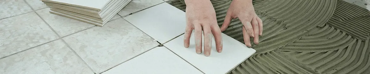 Professional installing white tile floors in Fort Worth, TX